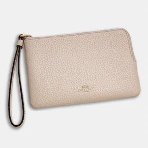 Coach white Z Zip wristlet.